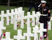 Marine Saluting at Cemetery